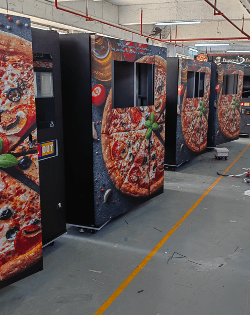 Pizza vending machines on the production line at the manufacturer’s Guangzhou factory Pizza vending machines on the production line at the manufacturer’s Guangzhou factory